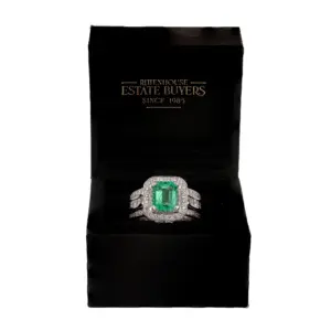 Platinum 2.06ct Emerald and 1.18ct Diamond Halo Ring
