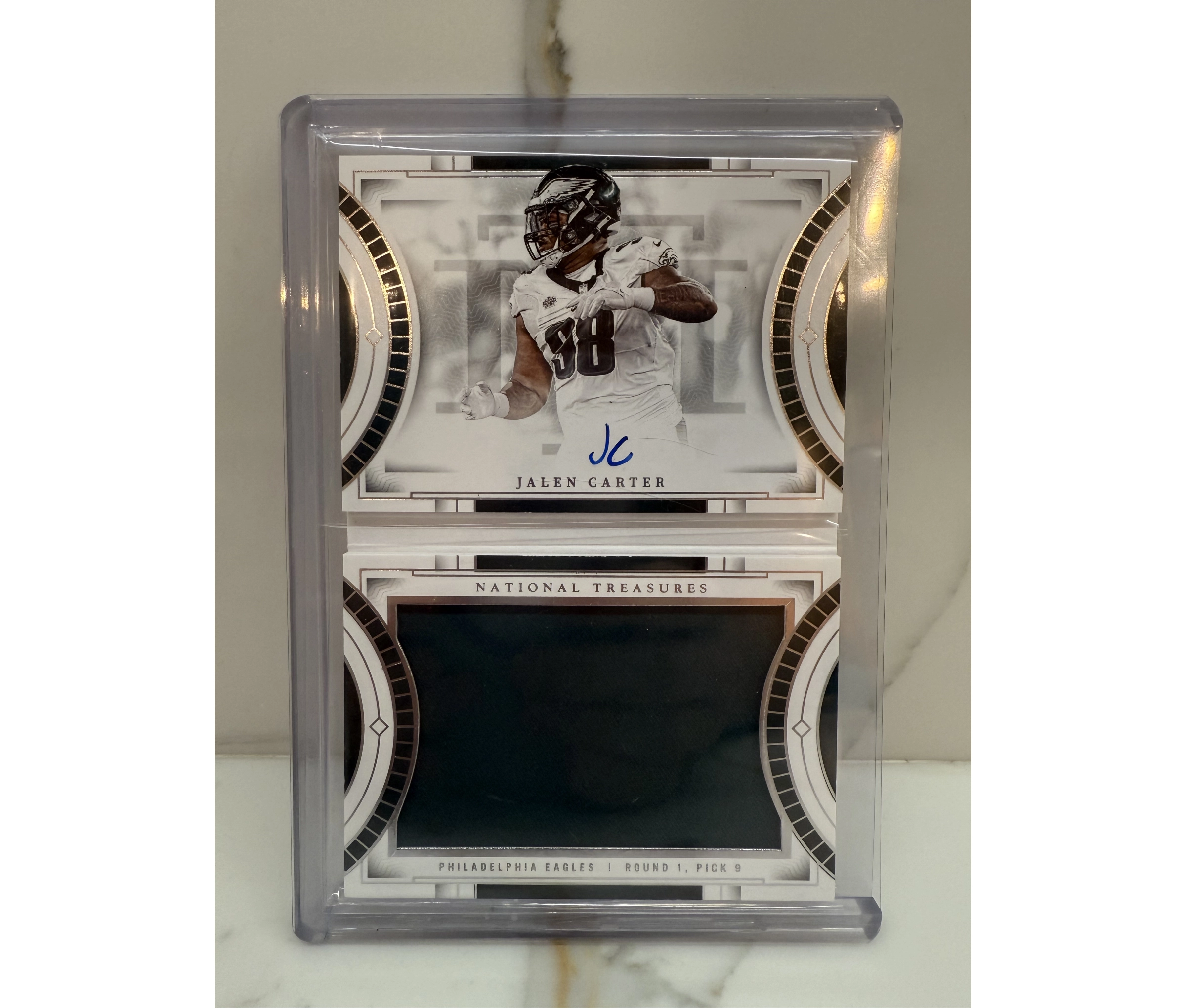 2023 Panini National Treasures Rookie Jumbo Signatures Booklet Jalen Carter /99 - Image 2