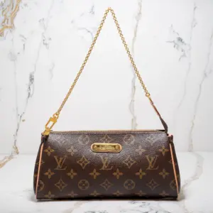 Louis Vuitton Monogram Eva Clutch w/Strap