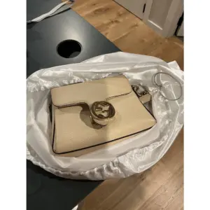 Gucci Crossbody Buckle Bag